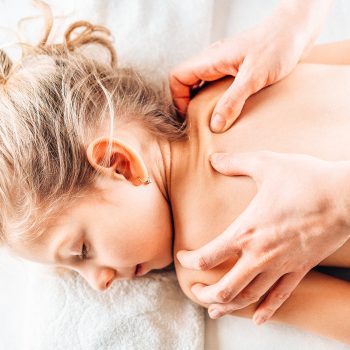 little-girl-on-massage-osteopathy-children-massa-2022-02-12-18-46-07-utc